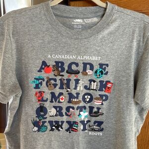 KID’S / Women Roots “A Canadian Alphabet”  T-Shirt NWOT